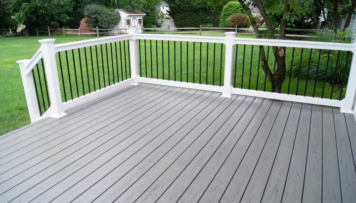 A deck railing and cover system in Hampton, providing safety and privacy for the outdoor space while adding a touch of elegance and style